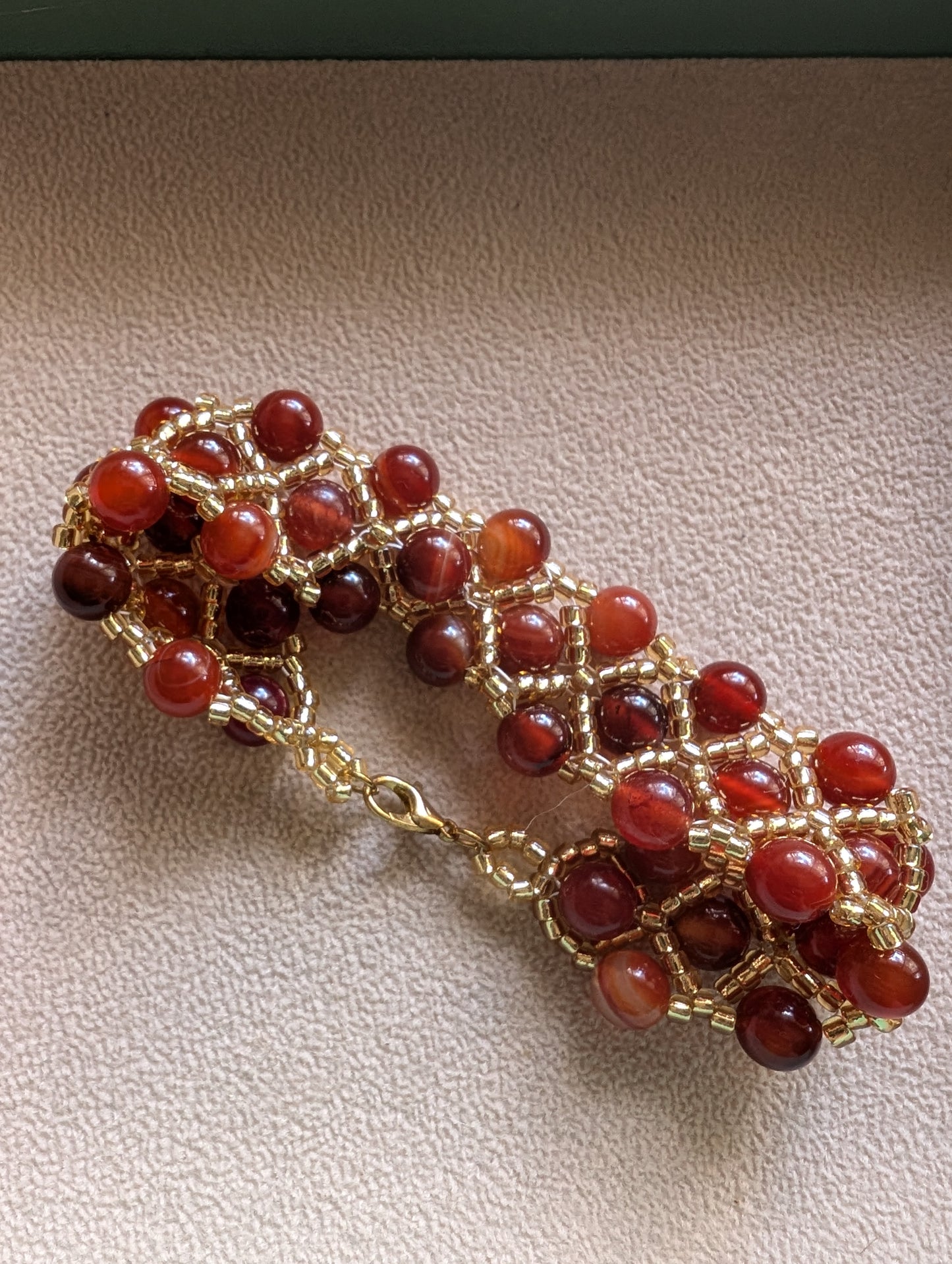 Hand made Bracelet with synthetic carnelian beads