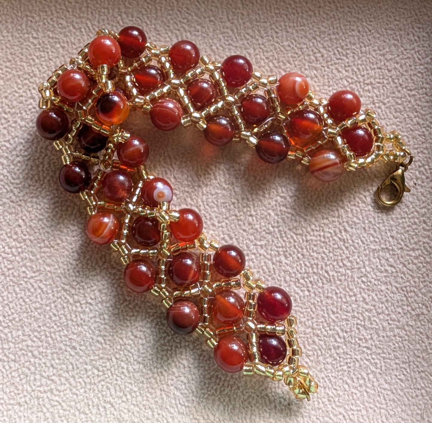 Hand made Bracelet with synthetic carnelian beads