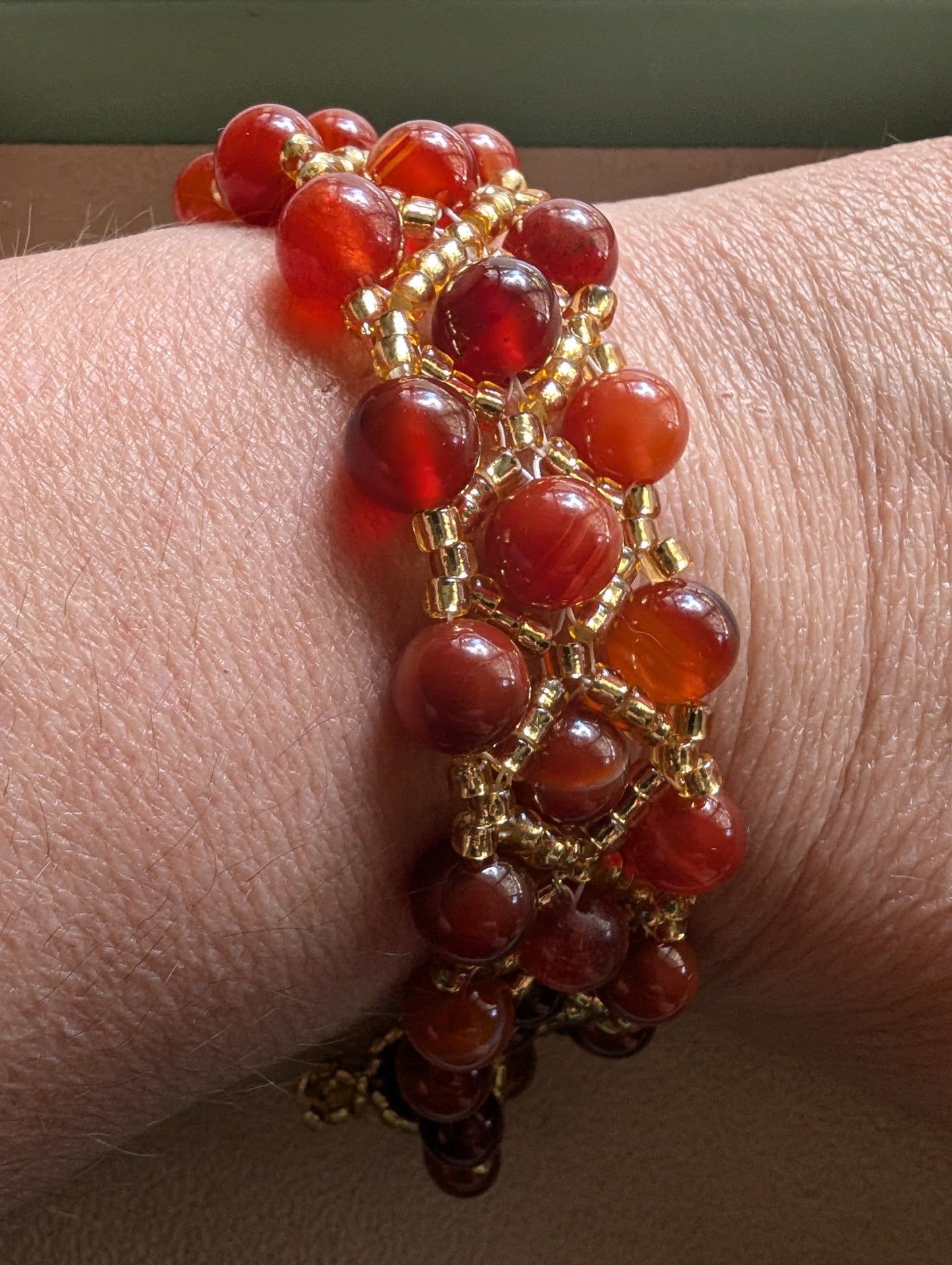 Hand made Bracelet with synthetic carnelian beads