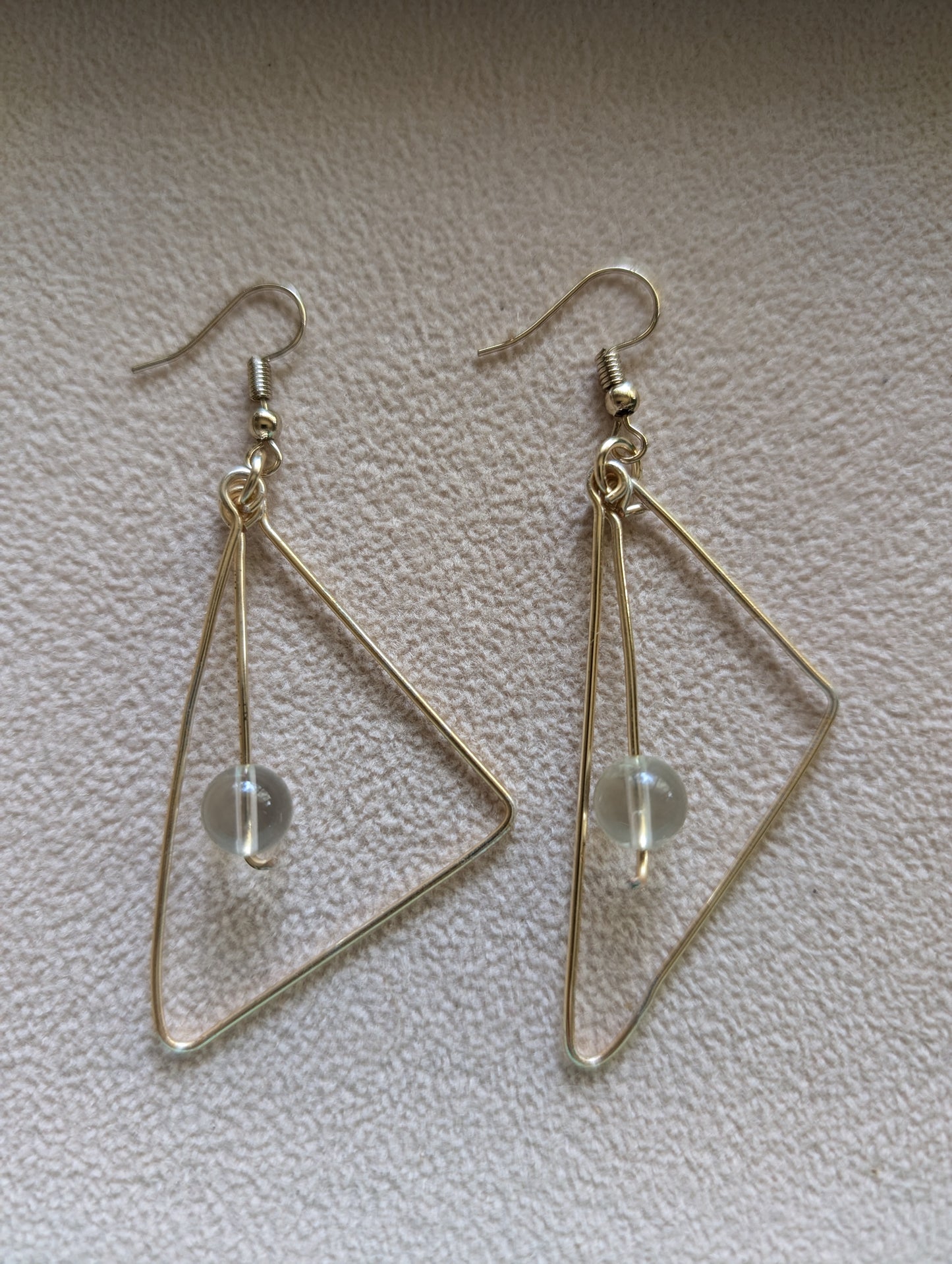 Triangle drop earrings in gold colour